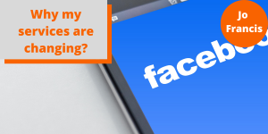 An image of a mobile phone with the facebook loading screen on it. On the left side of the image there is an orange rectangle with a grey rectangle layered over the top with orange text reading ‘Why my services are changing?’ and on the right side of the image there is an orange circle with white text reading ‘Jo Francis’